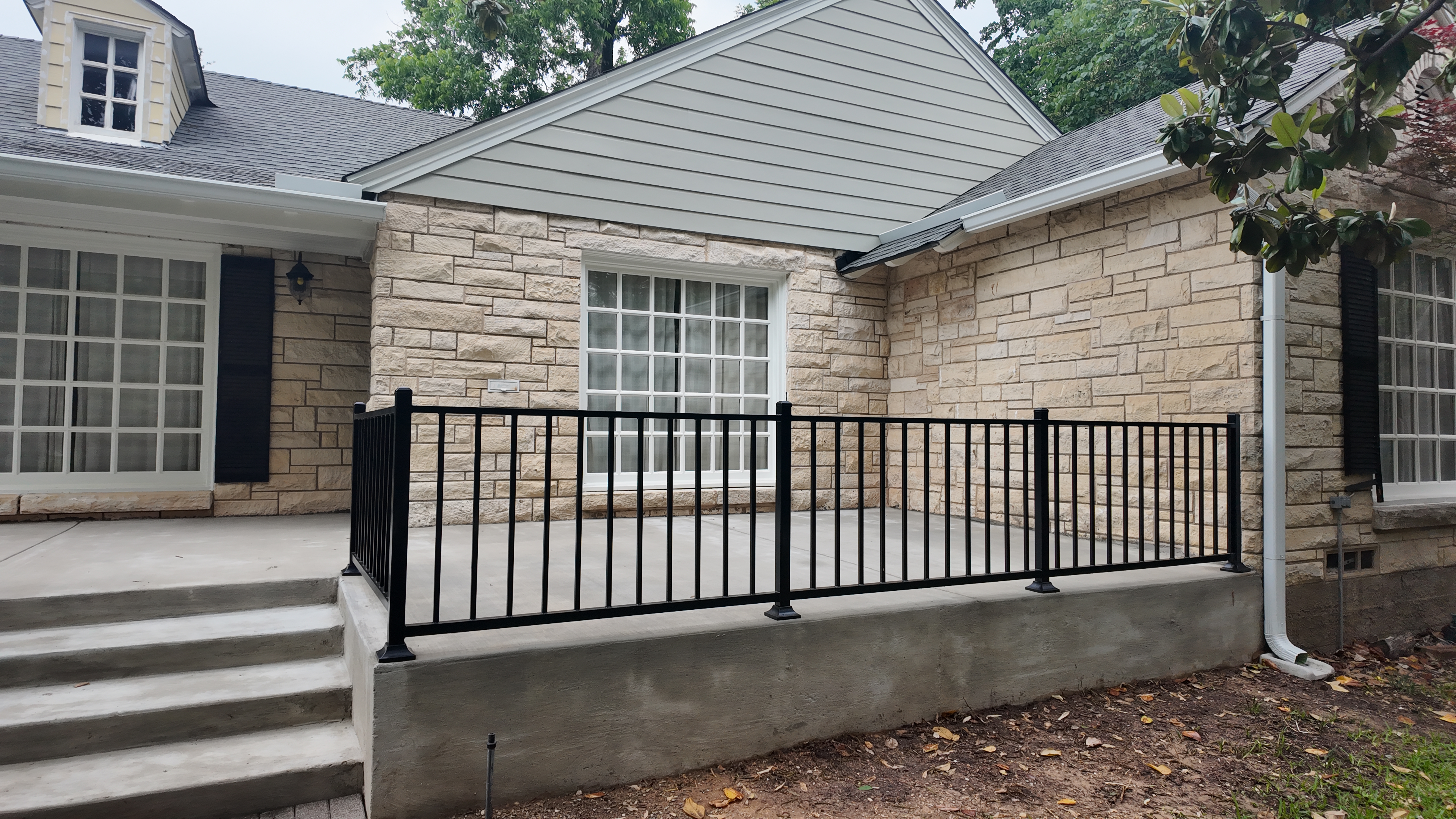 Concrete patio drone view in Kessler Park Dallas - gallery photo 1
