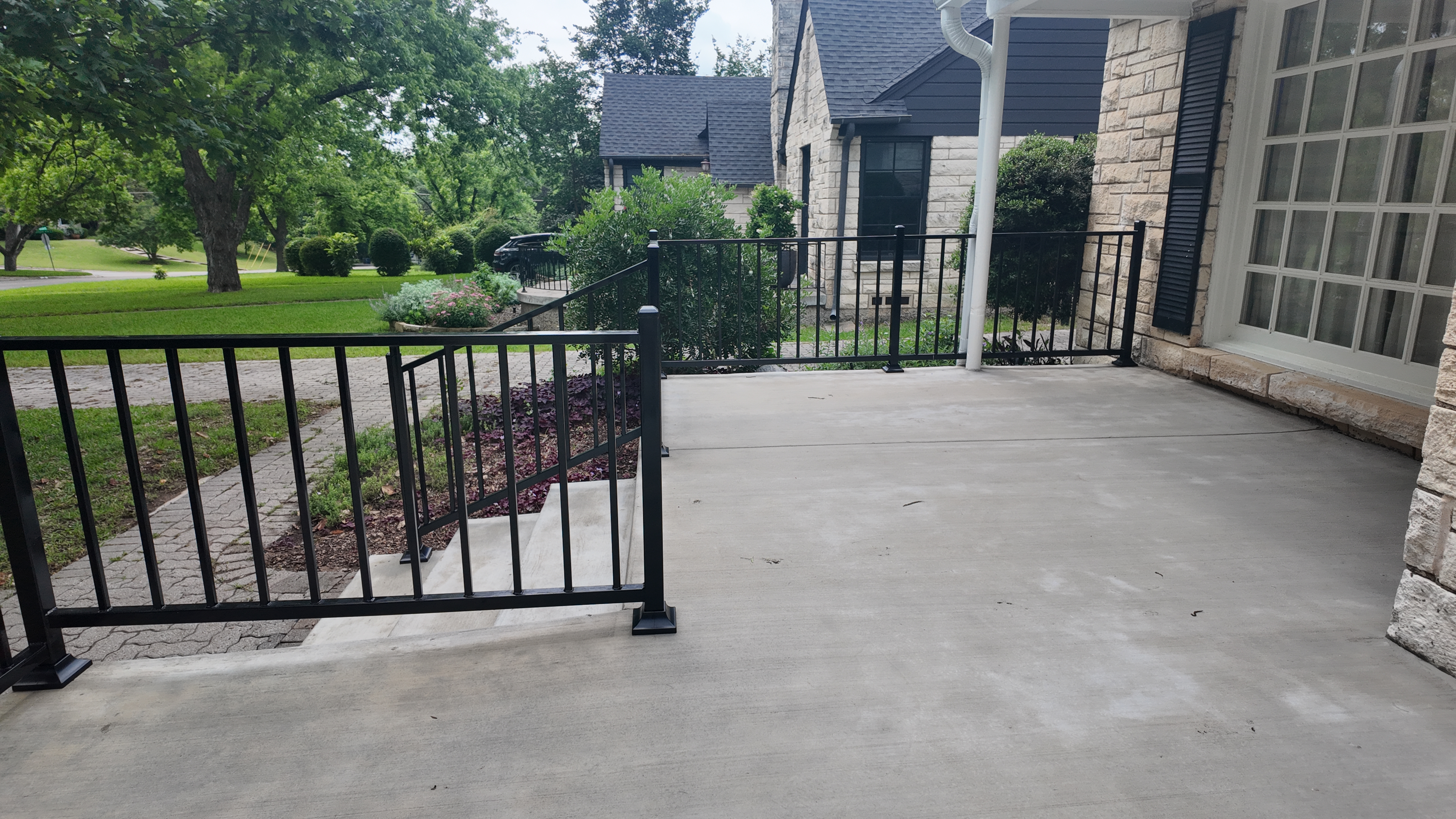 Concrete patio drone view in Kessler Park Dallas - gallery photo 4